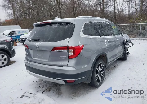 2019 Honda Pilot Touring z USA, uszkodzony, nr VIN 5FNYF6H62KB090155